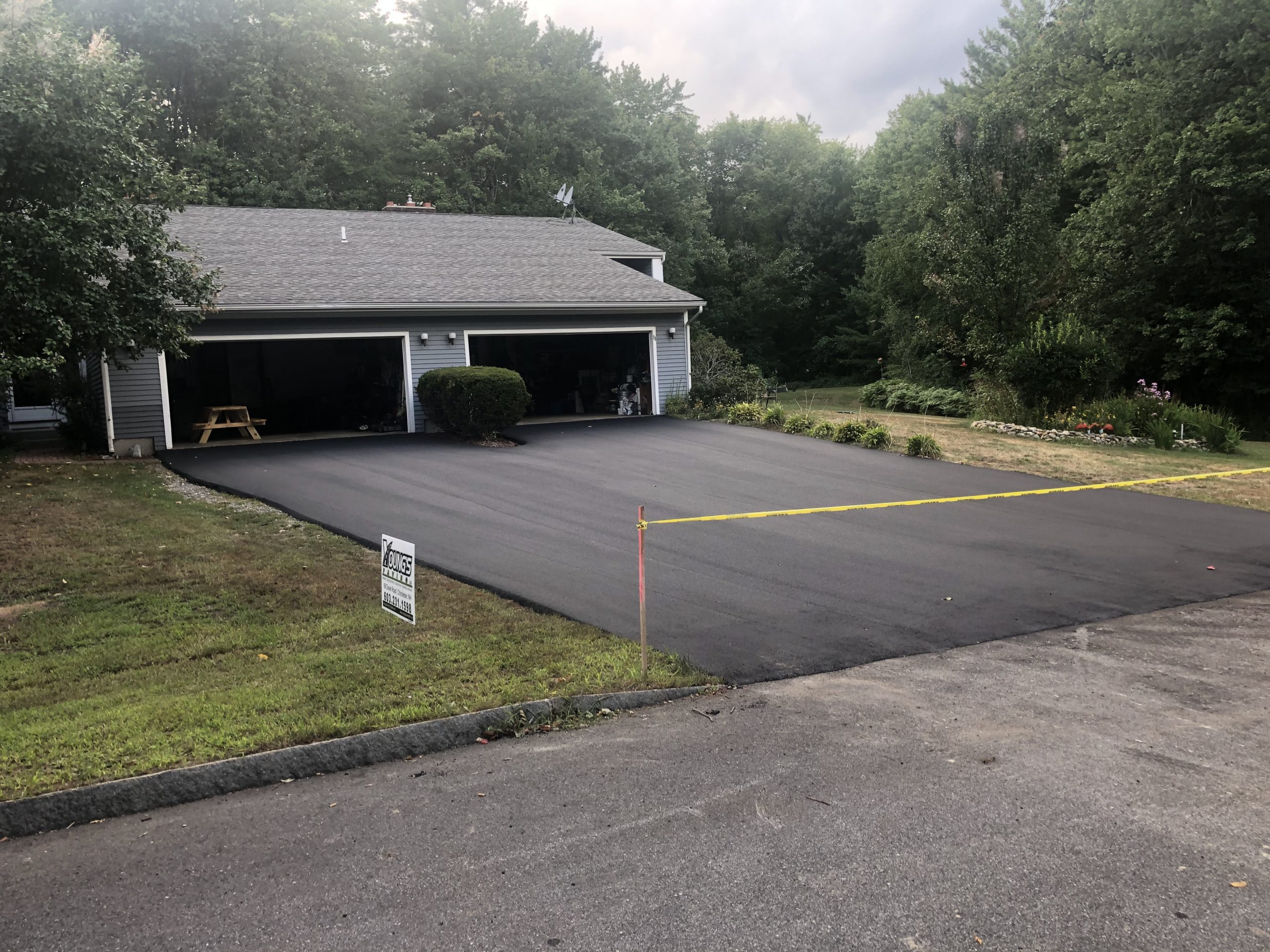 Newly paved asphalt driveway in Concord, NH by Young's Excavating & Paving LLC