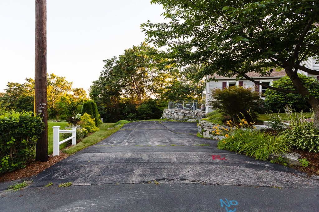 Residential driveway before excavation and paving in New Hampshire, photo 1 of 6