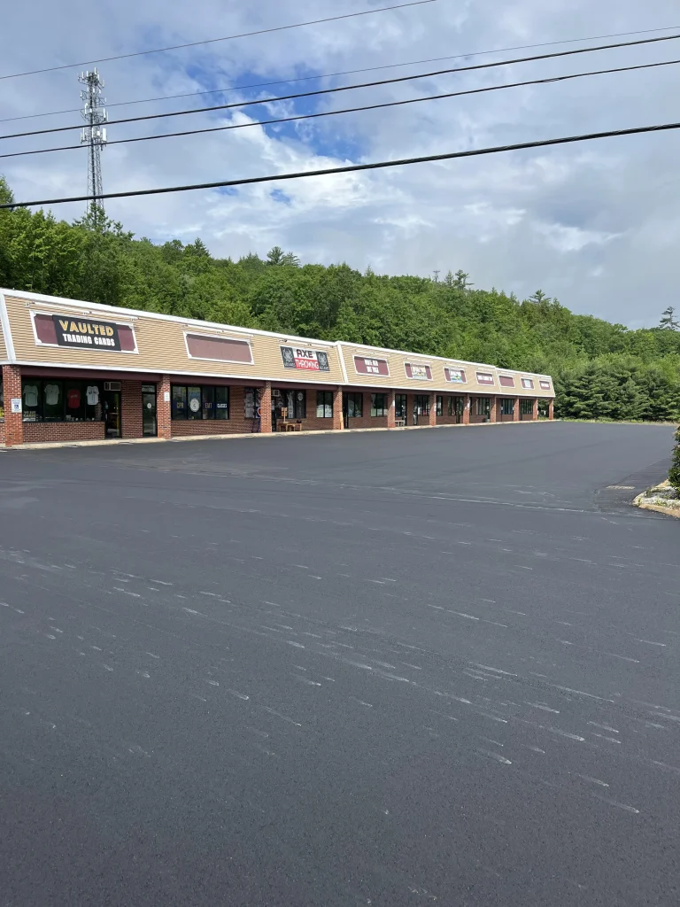 Newly paved asphalt parking lot in front of the strip mall at 680 White Mountain Highway in Tamworth, New Hampshire, after a full depth reclamation, Young's Excavating & Paving LLC, 37 Washington St, Penacook, NH.