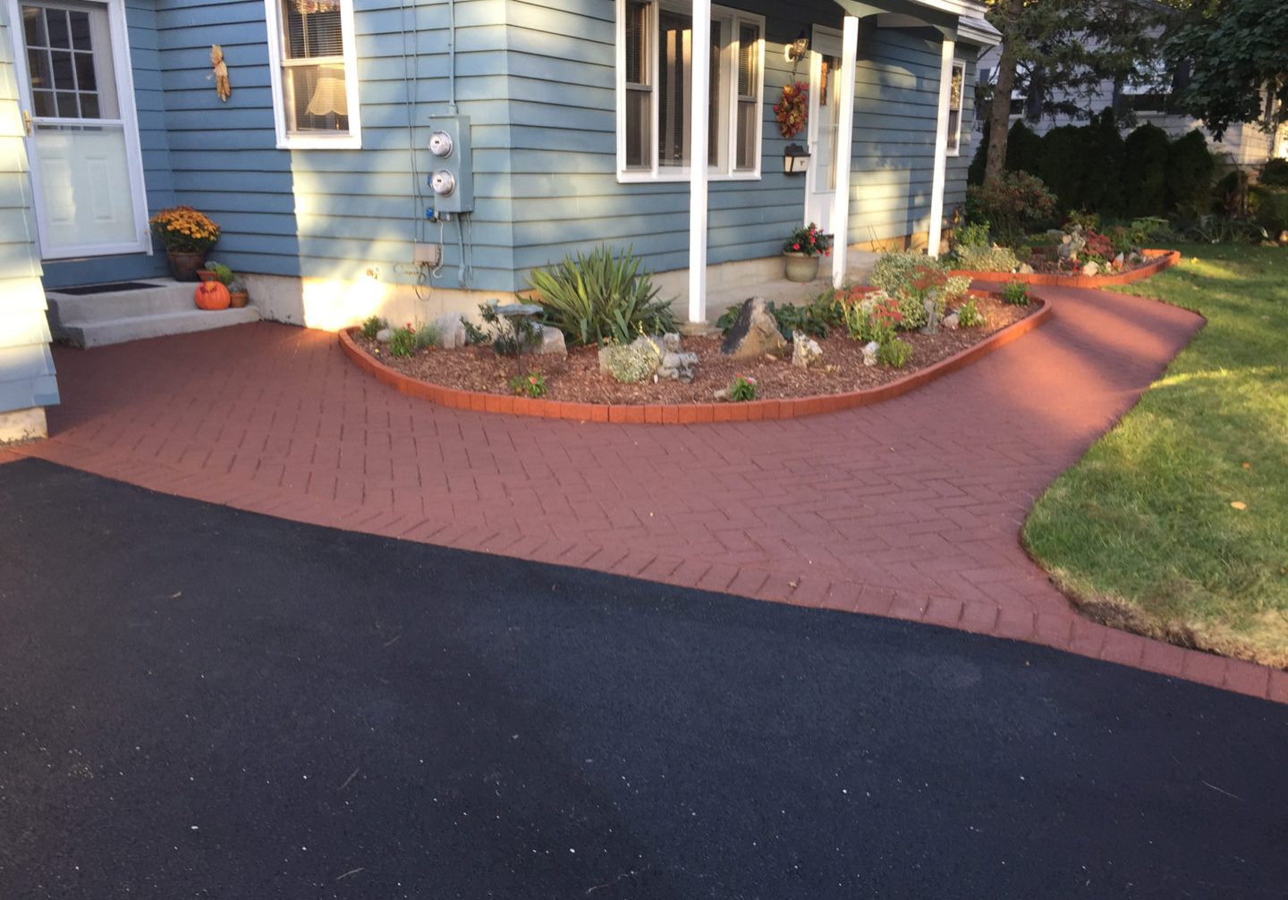 A stamped herringbone pattern walkway install